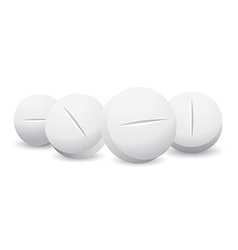 Four white pills vector image
