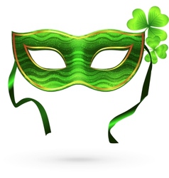 Green carnival mask with clovers vector image
