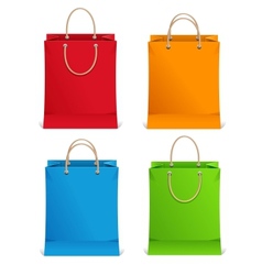 Shopping bags orange blue green and red vector image