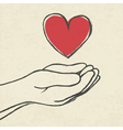 Heart in hands vector image
