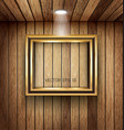 Gold frame on wood wall with spotlight vector image