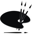 Palette and paint brushes vector image