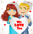 Man and woman holding banner heart We love you vector image