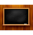 Blackboard on wooden background vector image