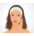 Girl applies make up vector image