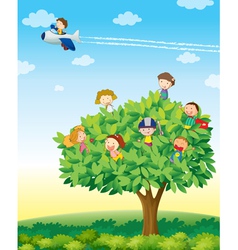 Kids playing on tree vector image