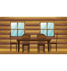 A table and chairs vector image