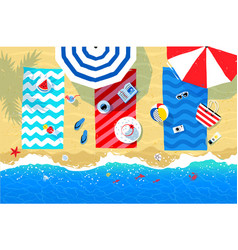 Beach mats and accessories on sand vector image