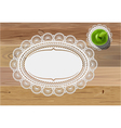 Doily mats and apple vector image
