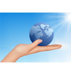 Hand with globe vector image