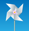 Paper pinwheel isolated on blue background vector image