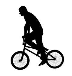 Black silhouette of a young man on a bike vector image