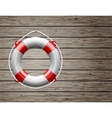 Life Buoy on a Wooden Paneled Wall vector image