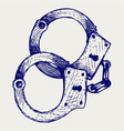 Metallic handcuffs vector image