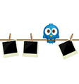 Three blank photos hanging on rope vector image