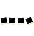 Four polaroid photos hanging on rope vector image