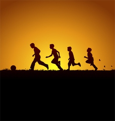 Running boys with the ball vector image