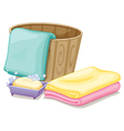 A pail with towels and a soap in a soap box vector image