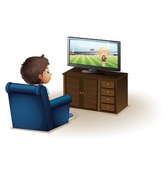 A young boy watching a television vector image