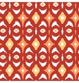 Red and gold ikat geometric seamless pattern vector image