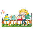 A lady hanging her clothes in the garden near the vector image