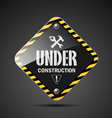 Under construction sign on black background vector image