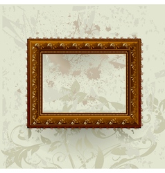 Gilded frame on grunge wall vector image