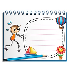 A notebook with a drawing of a boy pushing the vector image