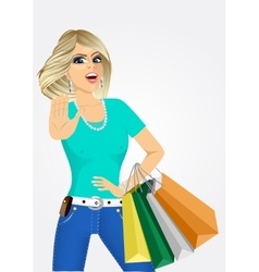 Cheering young woman with shopping bags vector image