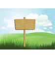 Wood sign in grass vector image