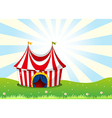 A circus tent at the top of the hill vector image