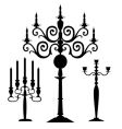 Set of candelabra silhouettes vector image