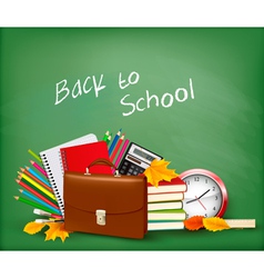 Green background with school supplies vector image