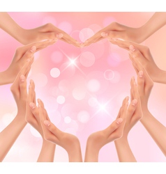 Hands making a heart Valentines day background vector image