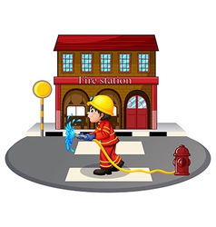 A fireman holding a hose vector image