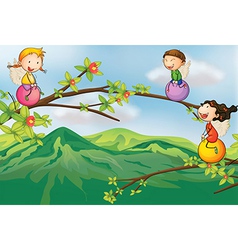 Kids playing at the tree vector image