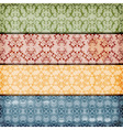 Floral borders on crumpled paper texture vector image