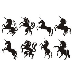 Heraldic unicorn silhouettes set vector image