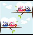 Couples of owls sitting on branches vector image