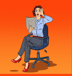 Pop art shocked business woman reading a newspaper vector image