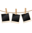 Photos hanging on a clothesline vector image