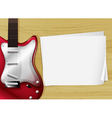 A red guitar with an empty piece of paper vector image