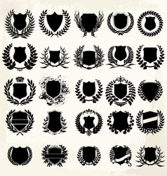 Set shield and laurel wreath set vector image